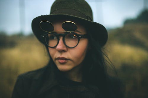 Woman Wearing Eyeglasses on a Field 