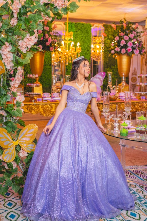 Portrait of a Quinceañera Posing in a Purple Dress