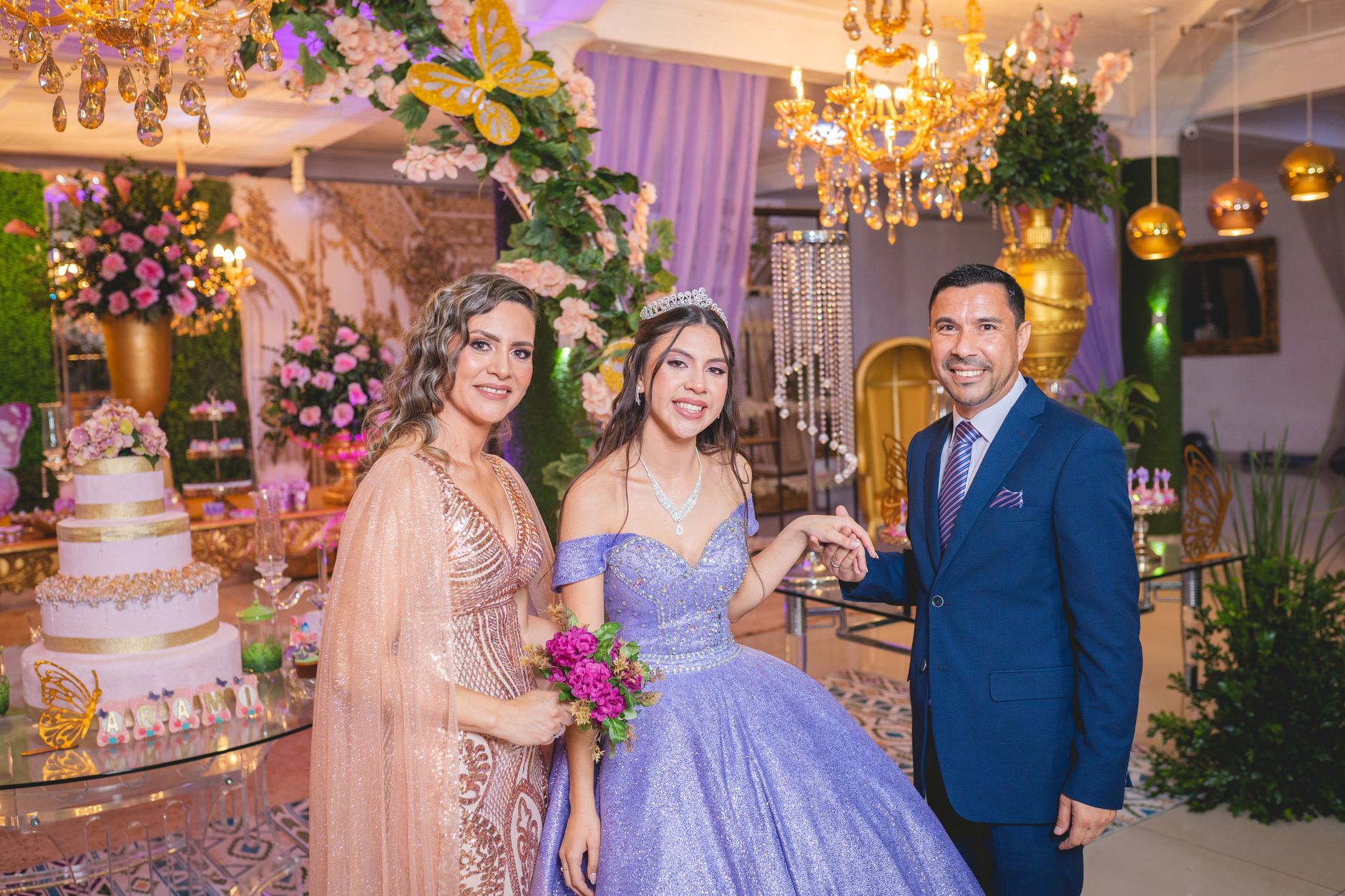 A beautiful quinceañera celebration with family, featuring elegant decor and joyful moments.