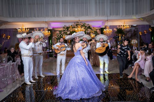 Bride in a Sombrero Hat and a Mexican Band Playing at a Wedding Reception 
