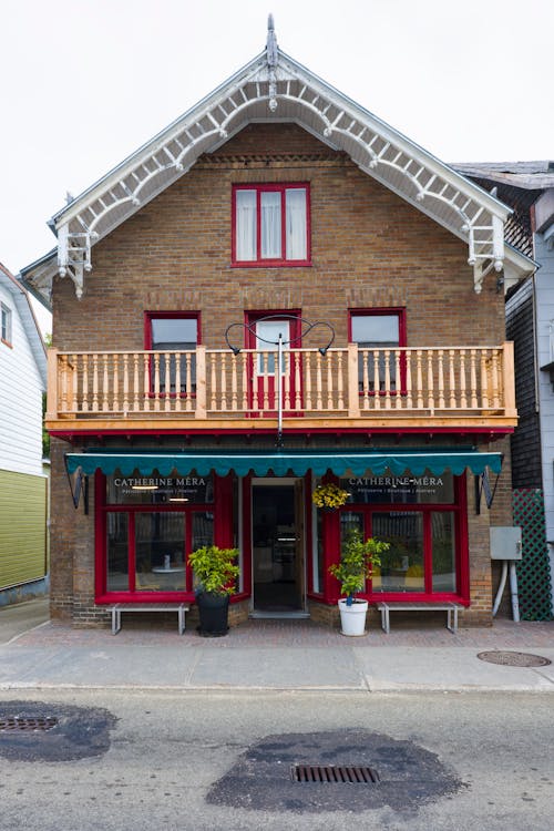 Photo of a Decorative Townhouse with a Balcony, and a Cafe on a Grand Floor