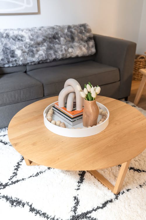 A coffee table with a book on it