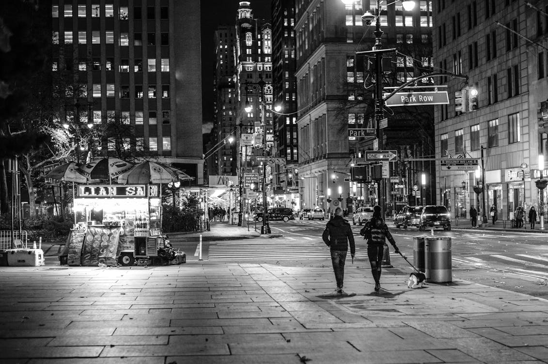 Black and White Photo of a Street of New York at Night