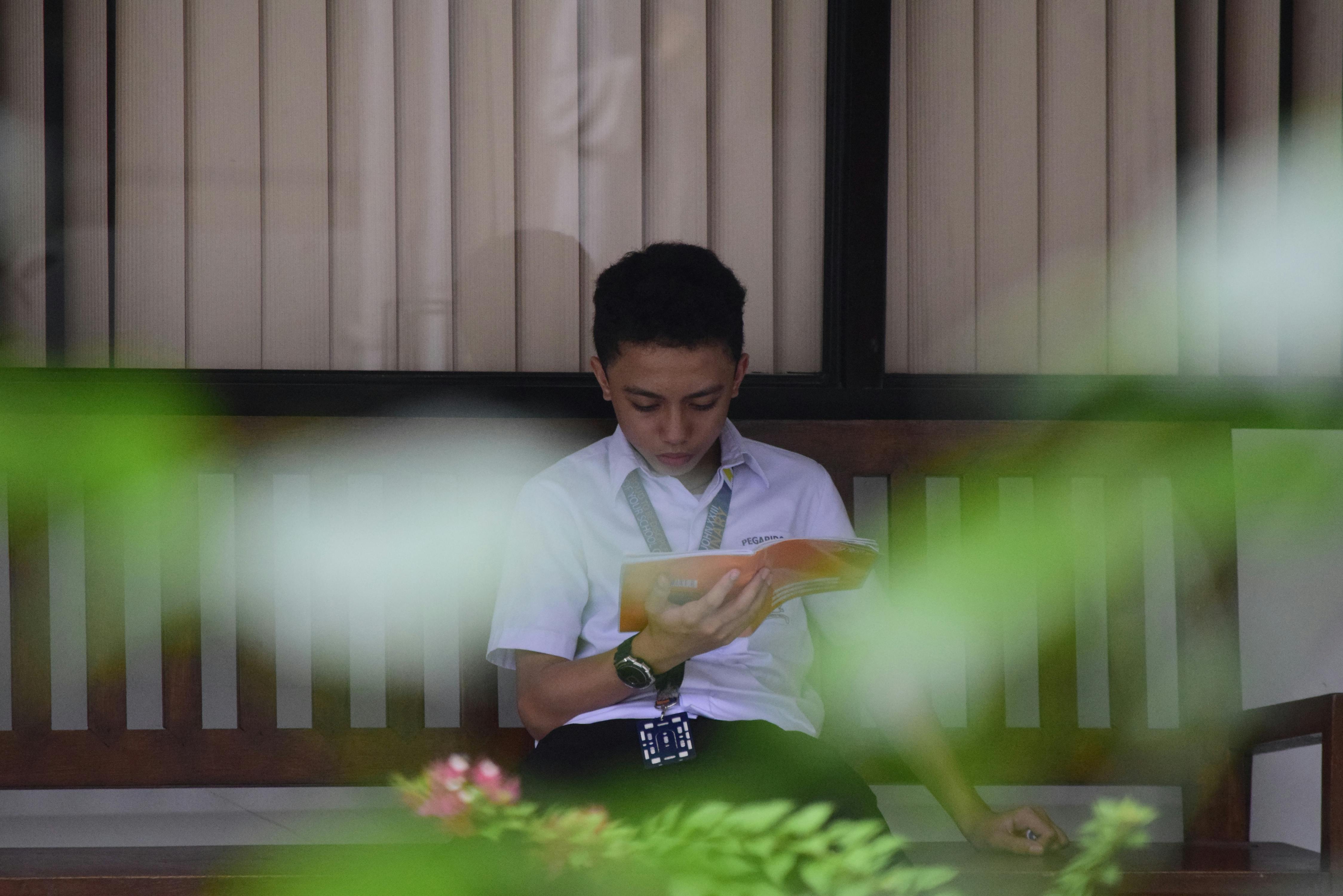 Free Boy Wearing White Polo Stock Photo