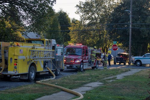View of Firetrucks Parked on the Side of a Street
