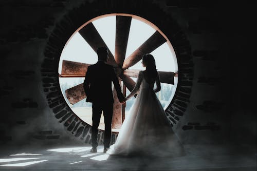 Woman Stand inside of Windmill