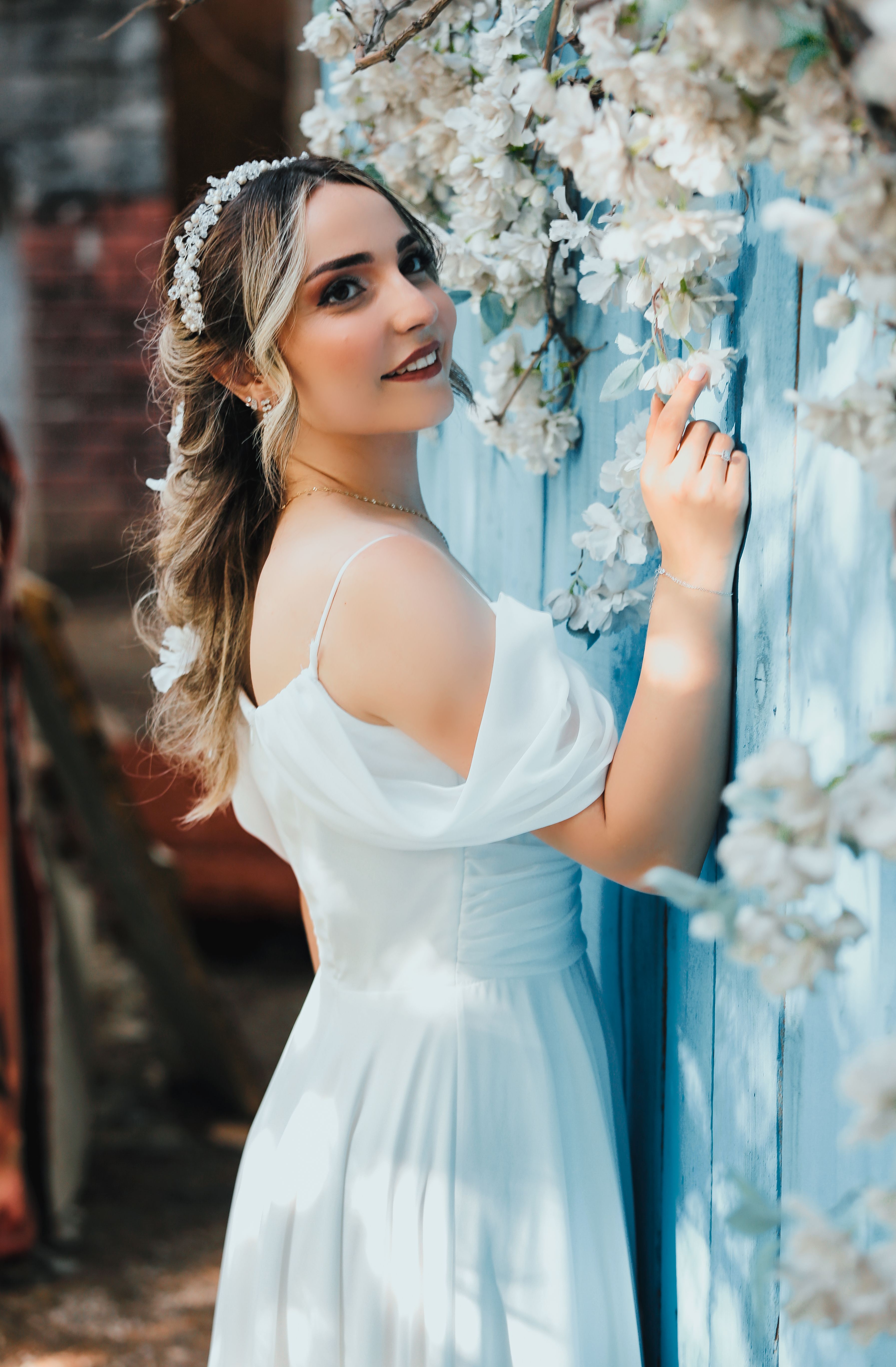 Smiling Woman in Blue Dress · Free Stock Photo