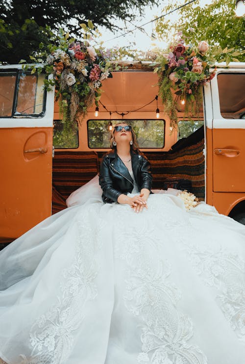 Bride Sits in Mini Van