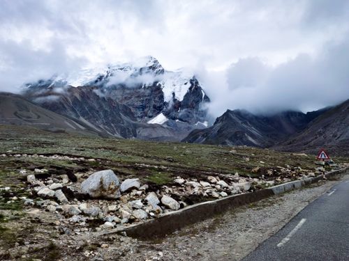Free Stunning mountain landscape in North Sikkim with clouds and rocky terrain, perfect for travel enthusiasts. Stock Photo
