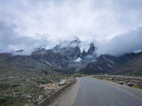 Asphalt Road at Foot of Snowy Mountain