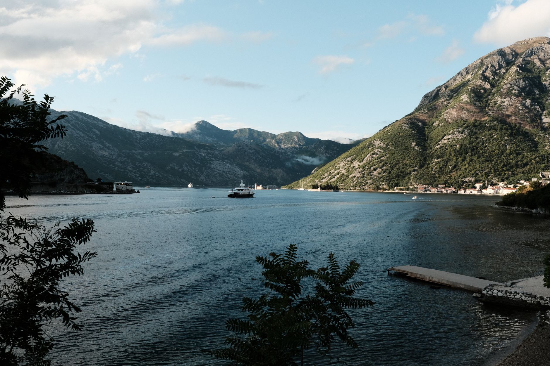 Captivating landscape of Kotor Bay with mountains and clear blue waters, perfect for travel enthusiasts.