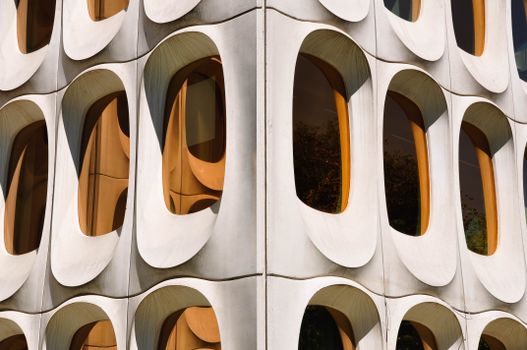 Close-up of a brutalist building showcasing a unique concrete window design with repetition. Located in Brussels.. pexels, cl