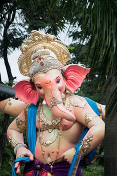 A vivid statue of Lord Ganesha adorned for Ganesh Chaturthi celebrations in Mumbai, India.