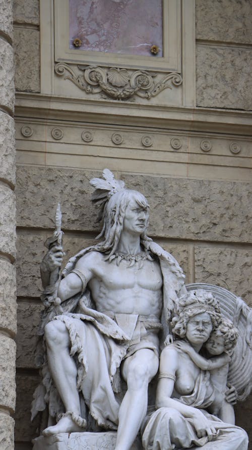 America and Australia Statues on the Facade of the Natural History Museum in Vienna, Austria