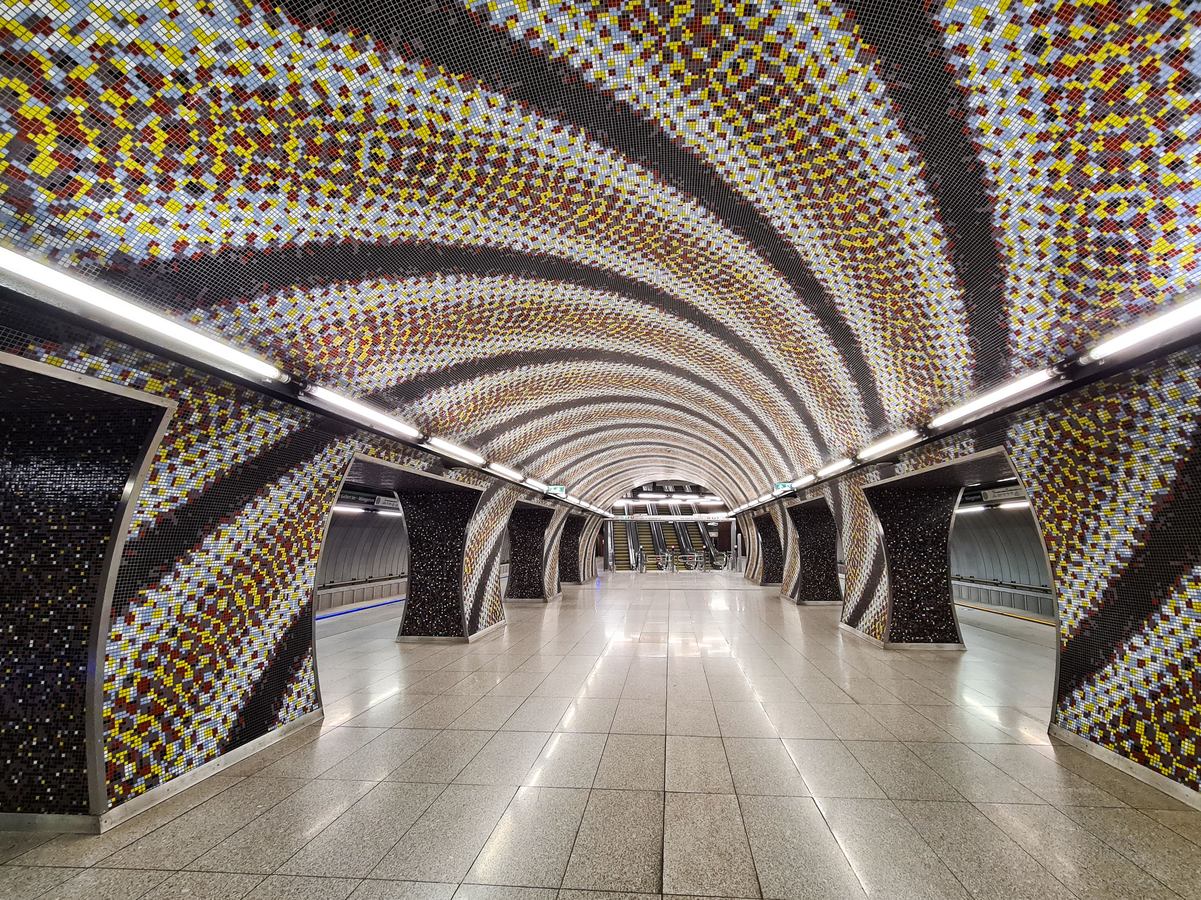 Modern interior of a Sofia Metro station in Bulgaria, showing clean platforms and signage.