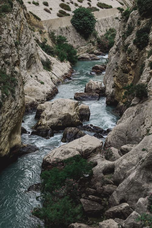 Free Captivating landscape of river gorge with rugged cliffs and flowing water in Spain. Stock Photo