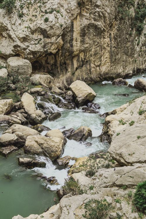 Free Picturesque river flowing through rocky landscape in Ardales, Spain. Stock Photo