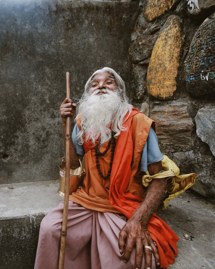 Elderly Man With A Stick 