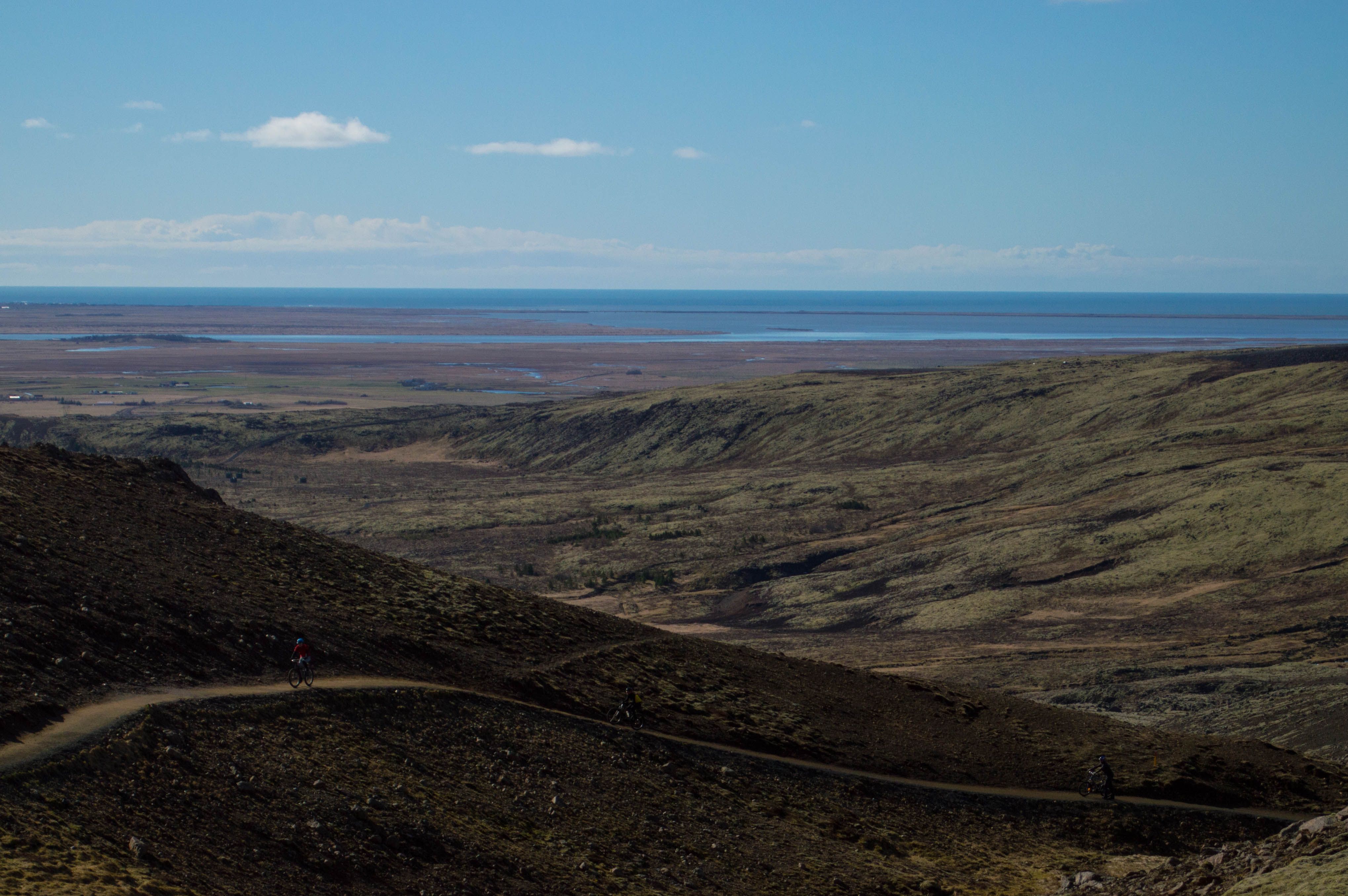 Breathtaking Icelandic landscape with vast hills under a clear sky near Reykjavík.