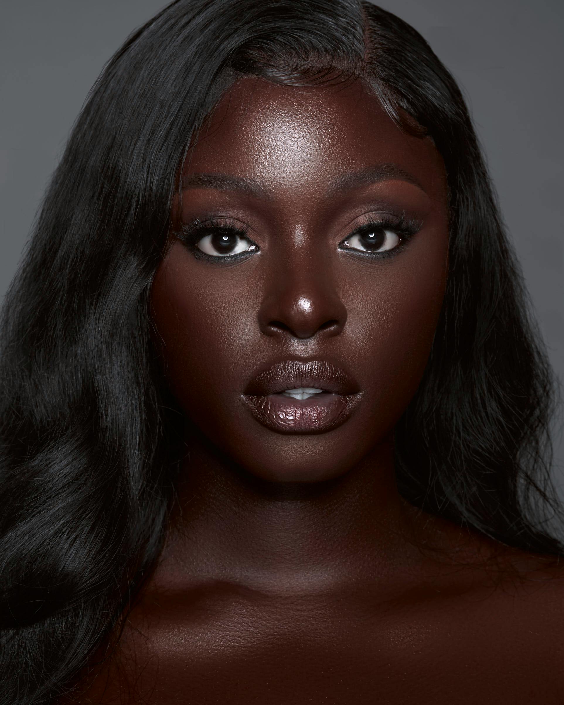 Camera-ready soft glam portrait for an engagement photoshoot