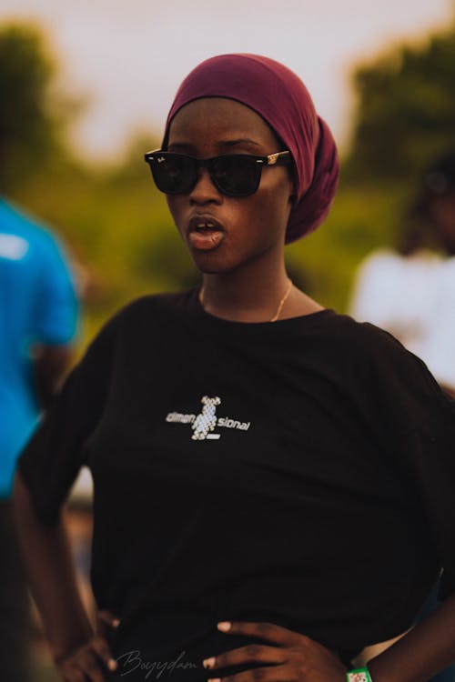 Woman in Tshirt and Sunglasses