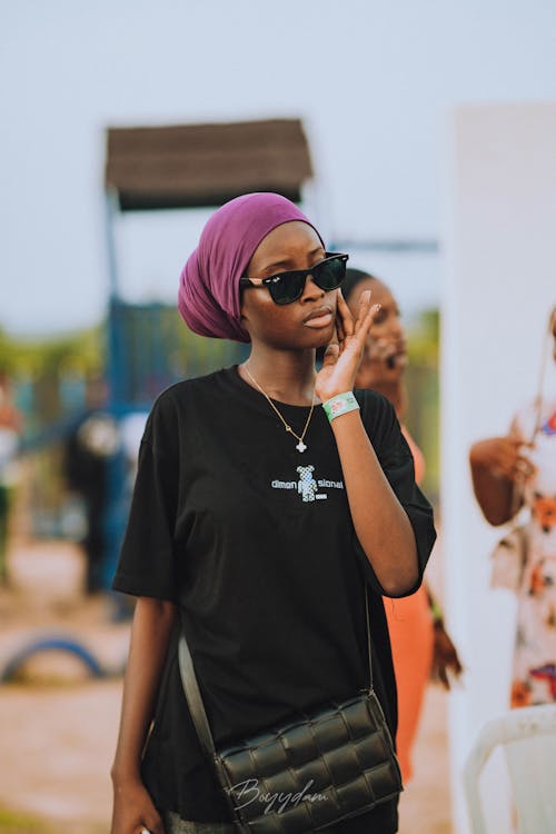 Woman in Shawl and Sunglasses