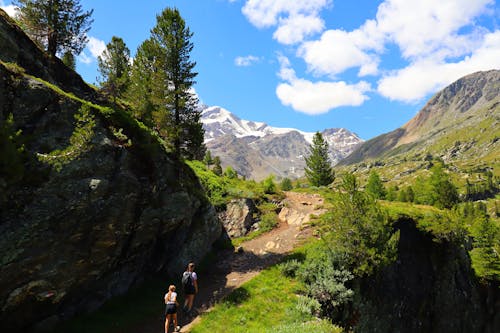 Couple Hiking a Mountain