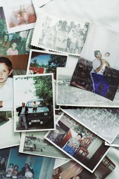 A nostalgic assortment of vintage family photographs from different eras.