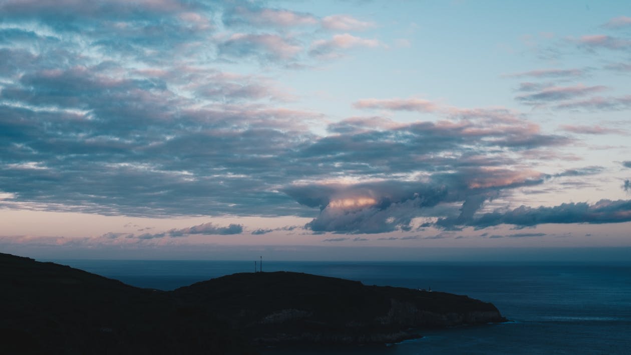 View of the Shore and the Sea at Sunset 