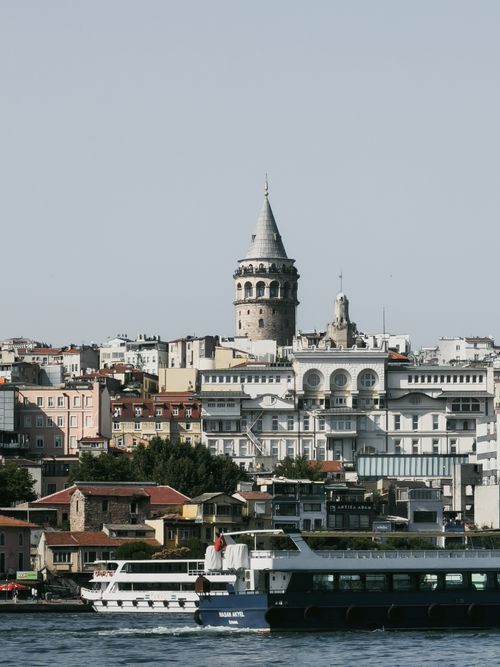 Free A picturesque scene of Galata Tower with the Bosphorus and urban landscape in Istanbul, Turkey. Stock Photo