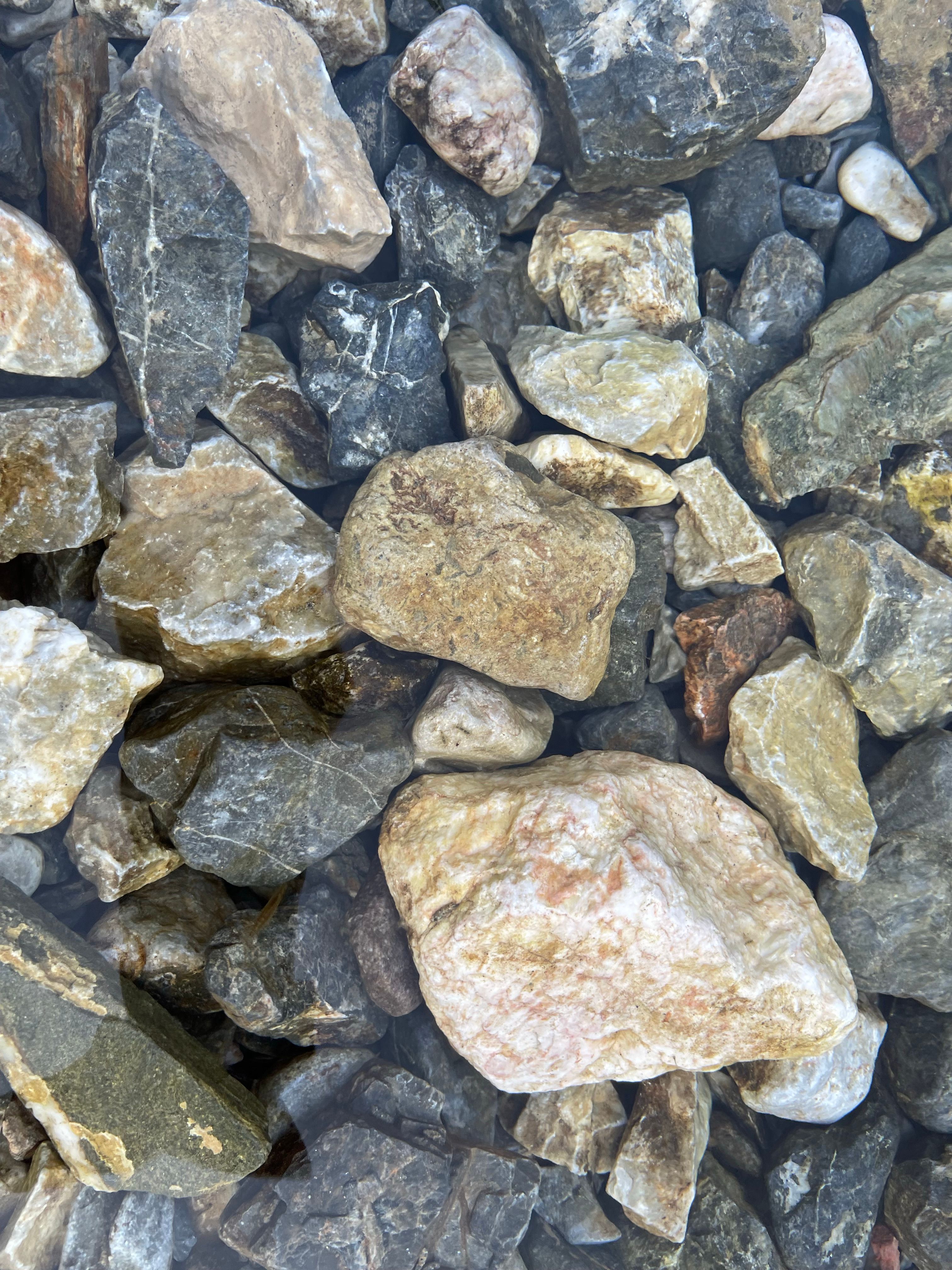 Clsoe-up of Colorful Rocks and Stones in Water · Free Stock Photo