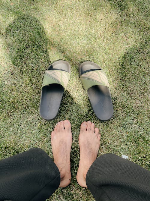 Barefoot and Sandals on Grass