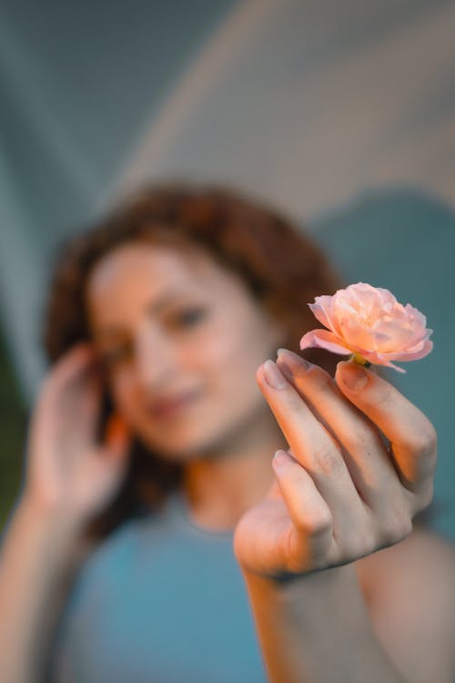 Flower in Woman Hand