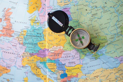 Compass Lying on a Map of Europe 