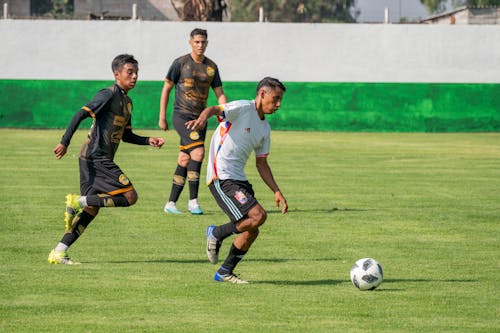 Men Playing Football