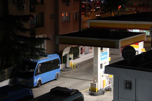 Bus at the Gas Station at Night