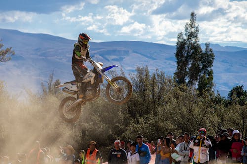 Man Jumping on a Motocross During a Competition