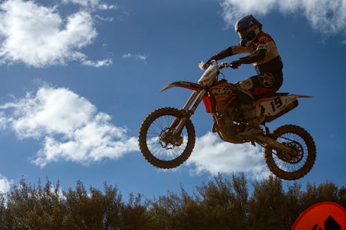 Man Jumping on Enduro Motorcycle