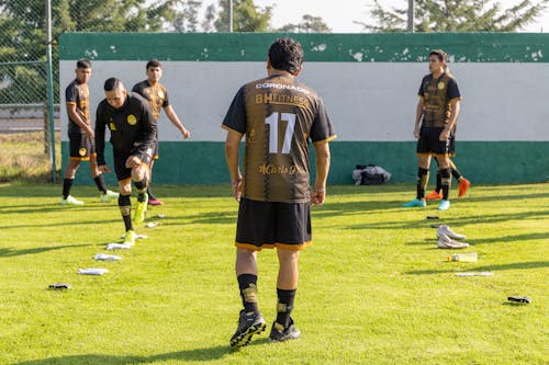 Men Training on the Soccer Field