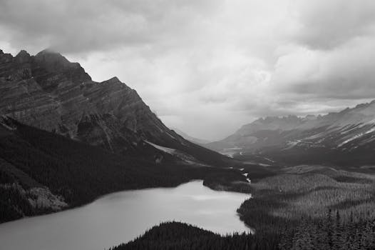 Black and white image of mountains and lake in Jasper National Park, Canada.