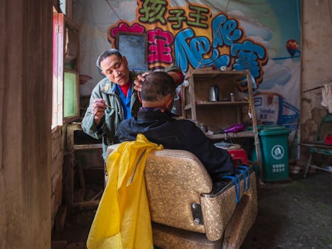 A barber giving a haircut in a rustic, colorful shop filled with vintage charm.