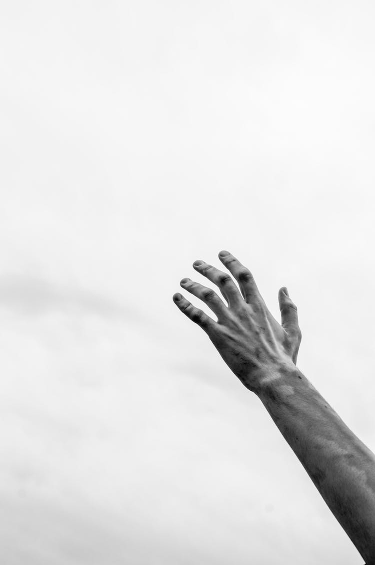 Man Hand Against Sky