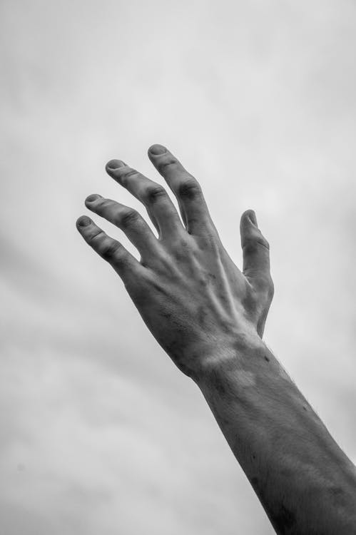 Close-up of Man Hand Touching Air