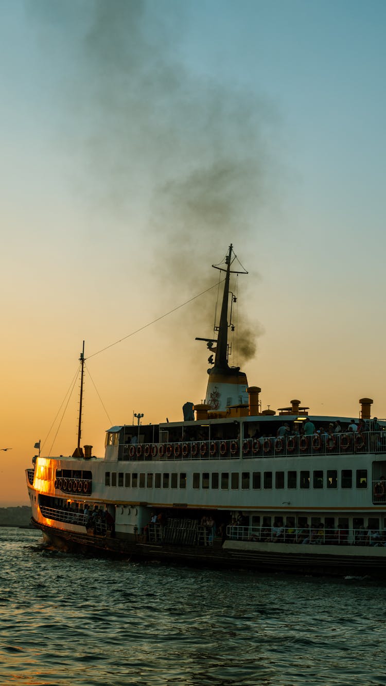 Istanbul Ferry Sailing At Sunset 