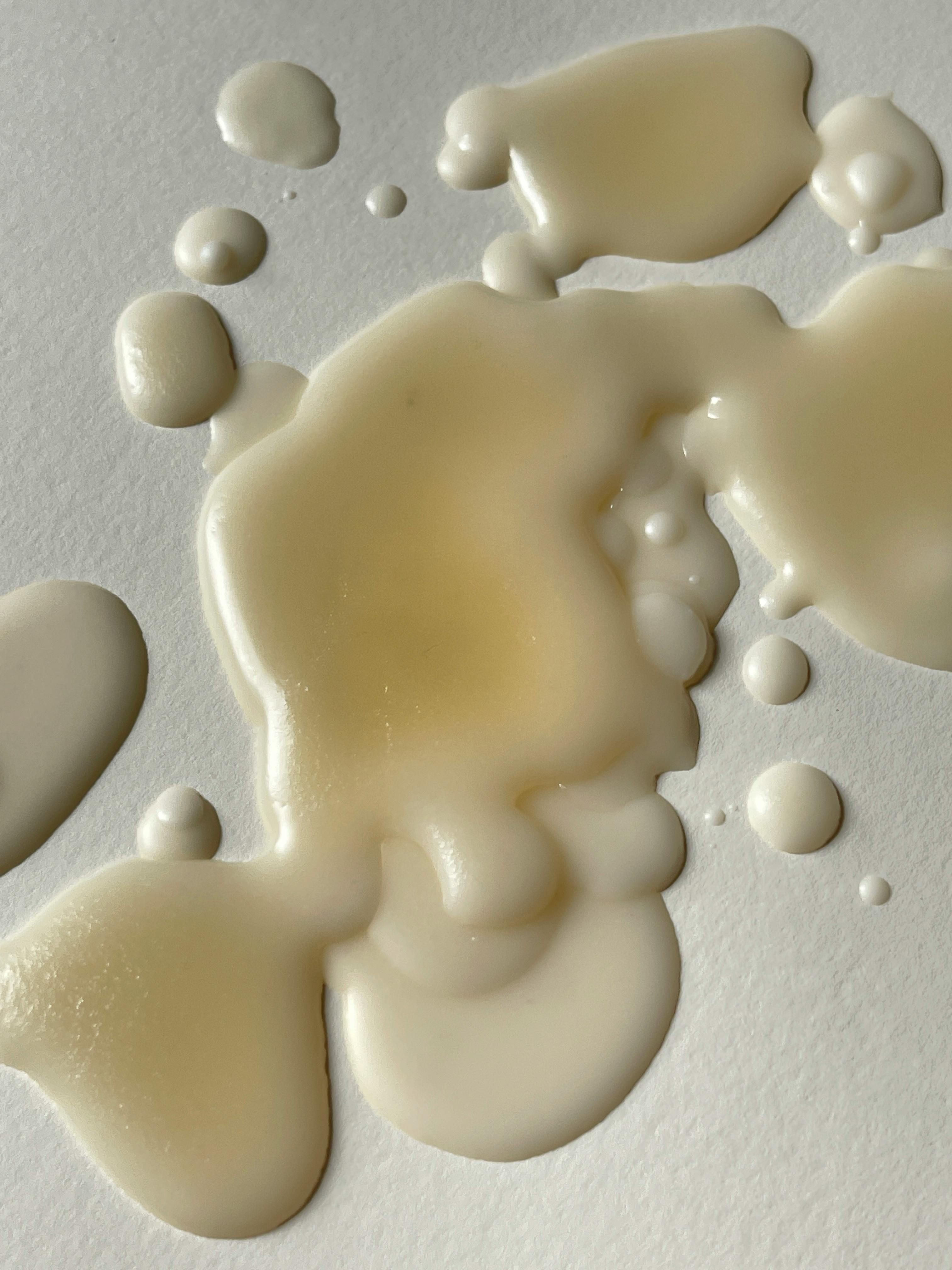 close up of white wax of a melted candle