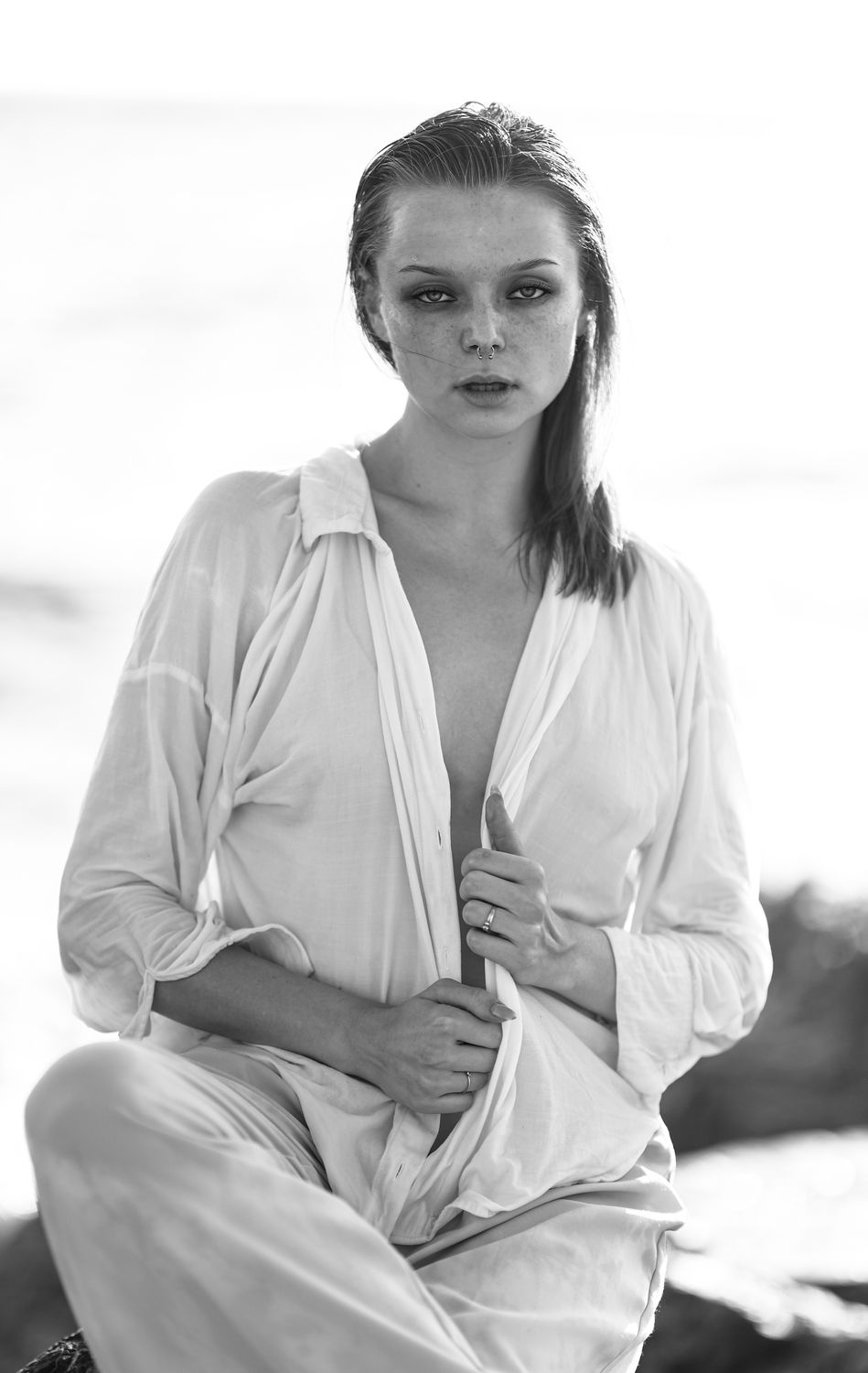 Black and White Picture of a Young Woman in a Shirt · Free Stock Photo