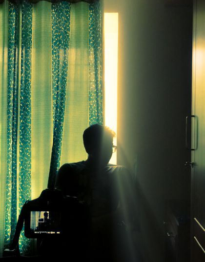 Silhouette by a sunlit window — photo by Pavan Chandra on Pexels