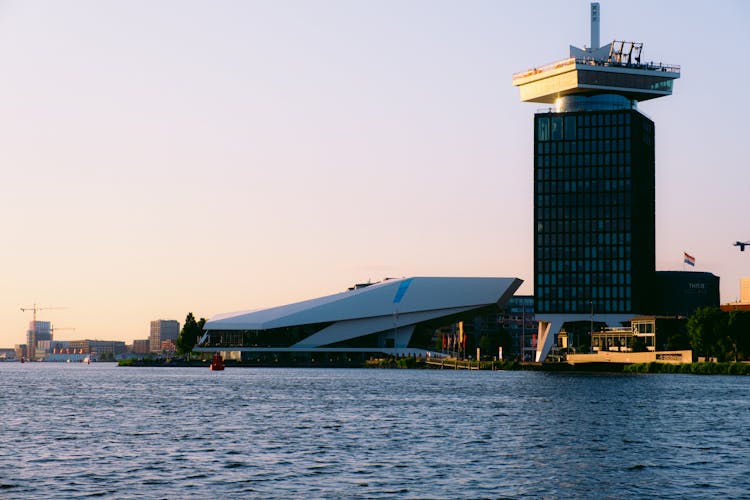 The ADAM Tower Seen From The Canal In Amsterdam, Netherlands 