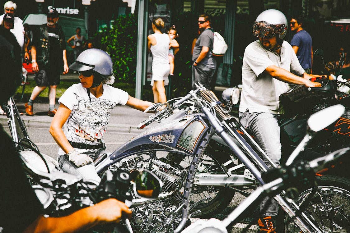Photo of People Riding Motorcycle