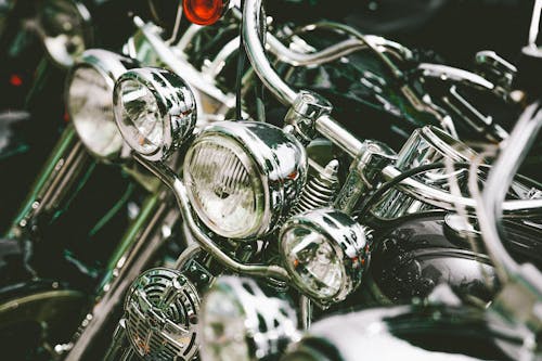 Close-Up Photo of Motorcycle Headlights